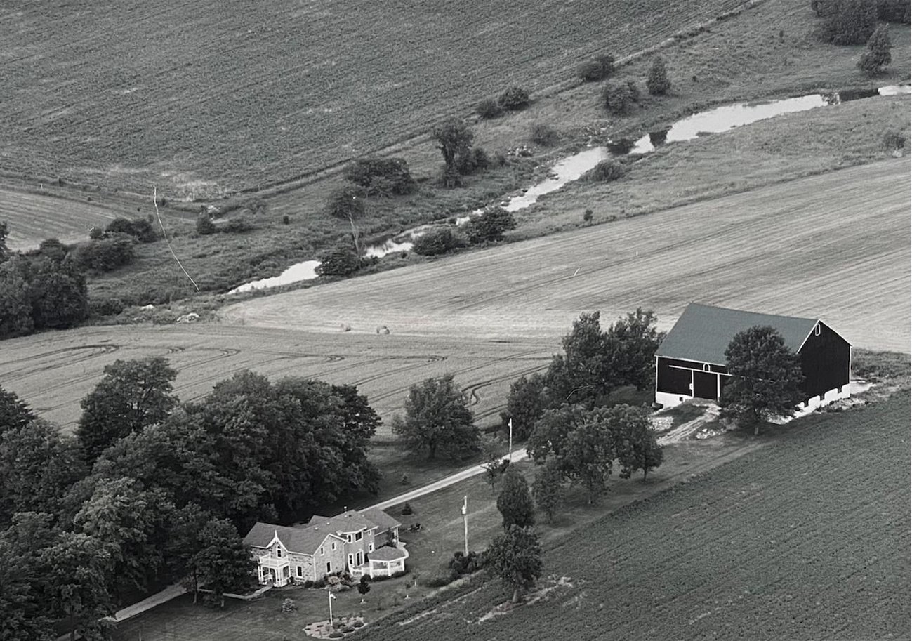 The Coffey family farm, black and white aerial photo